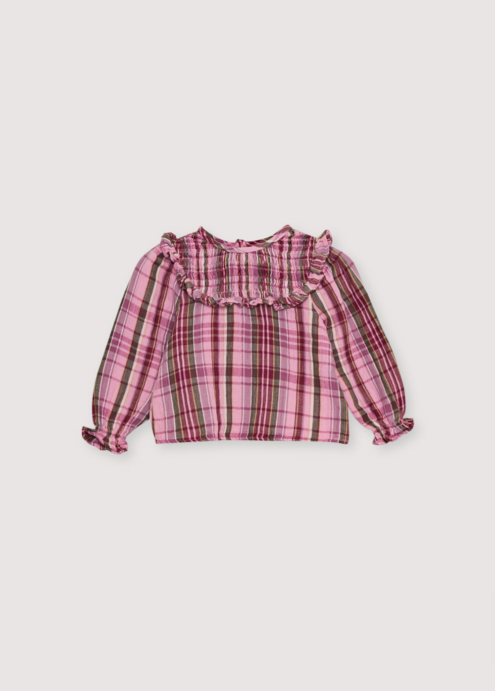 Baby blouse in checkered double gauze with a smocked yoke and ruffle detail. It features a back opening with a placket and buttons. Perfect for pairing with the matching bloomer.