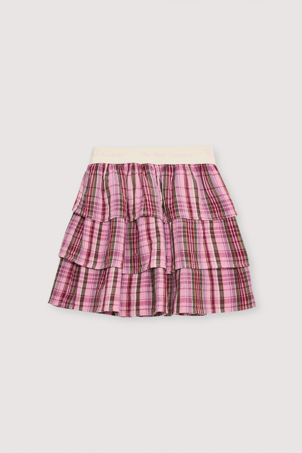 Checkered skirt in double gauze fabric with three ruffles and a branded elastic waistband. Perfect for pairing with the matching blouse.