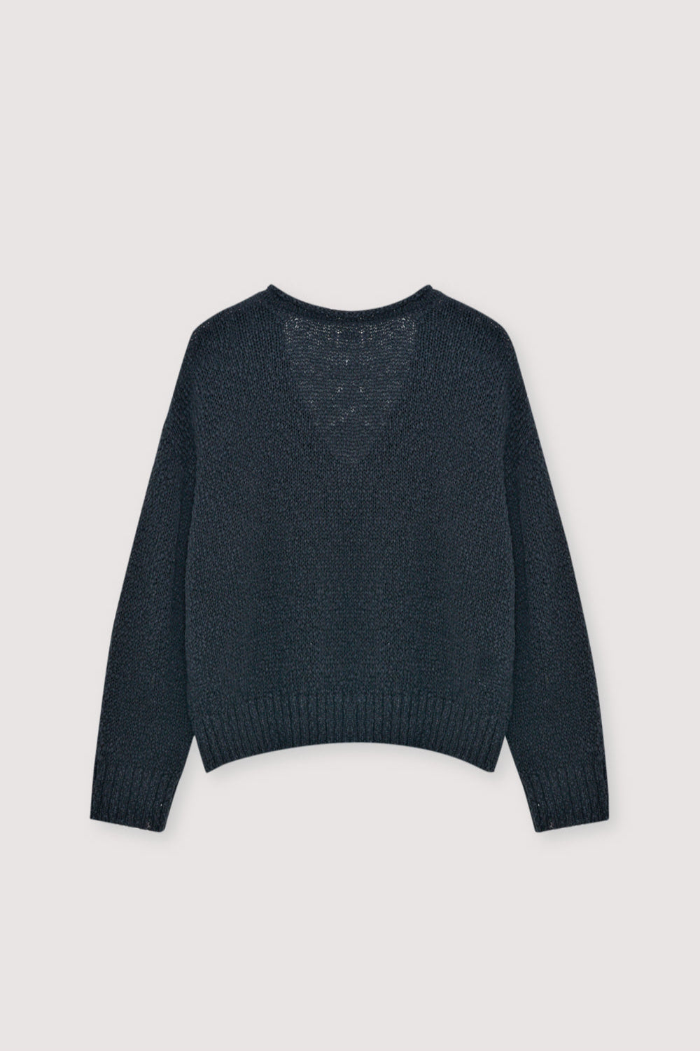 100% cotton sweater crafted with a rustic knit texture for a natural yet modern look.