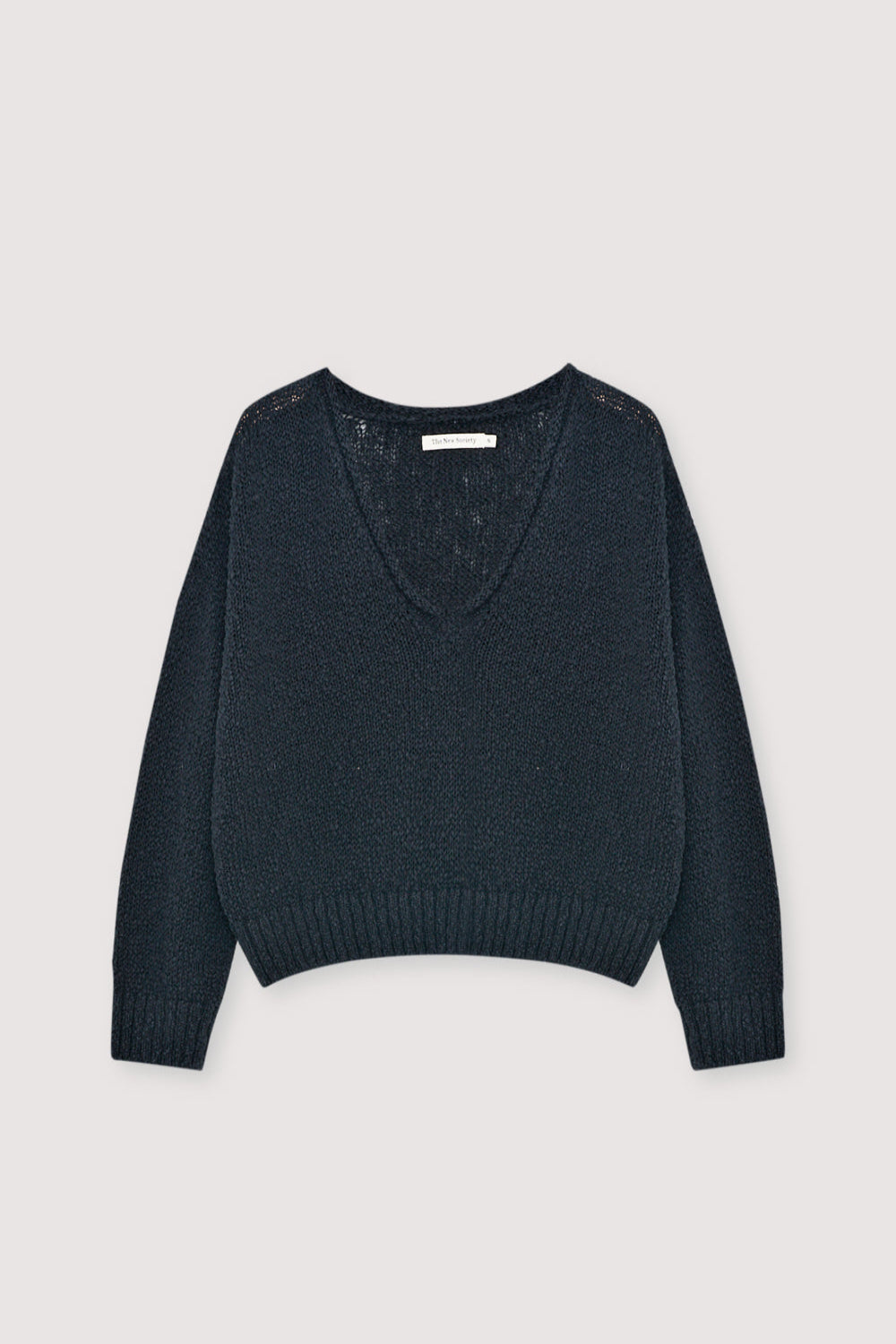100% cotton sweater crafted with a rustic knit texture for a natural yet modern look.