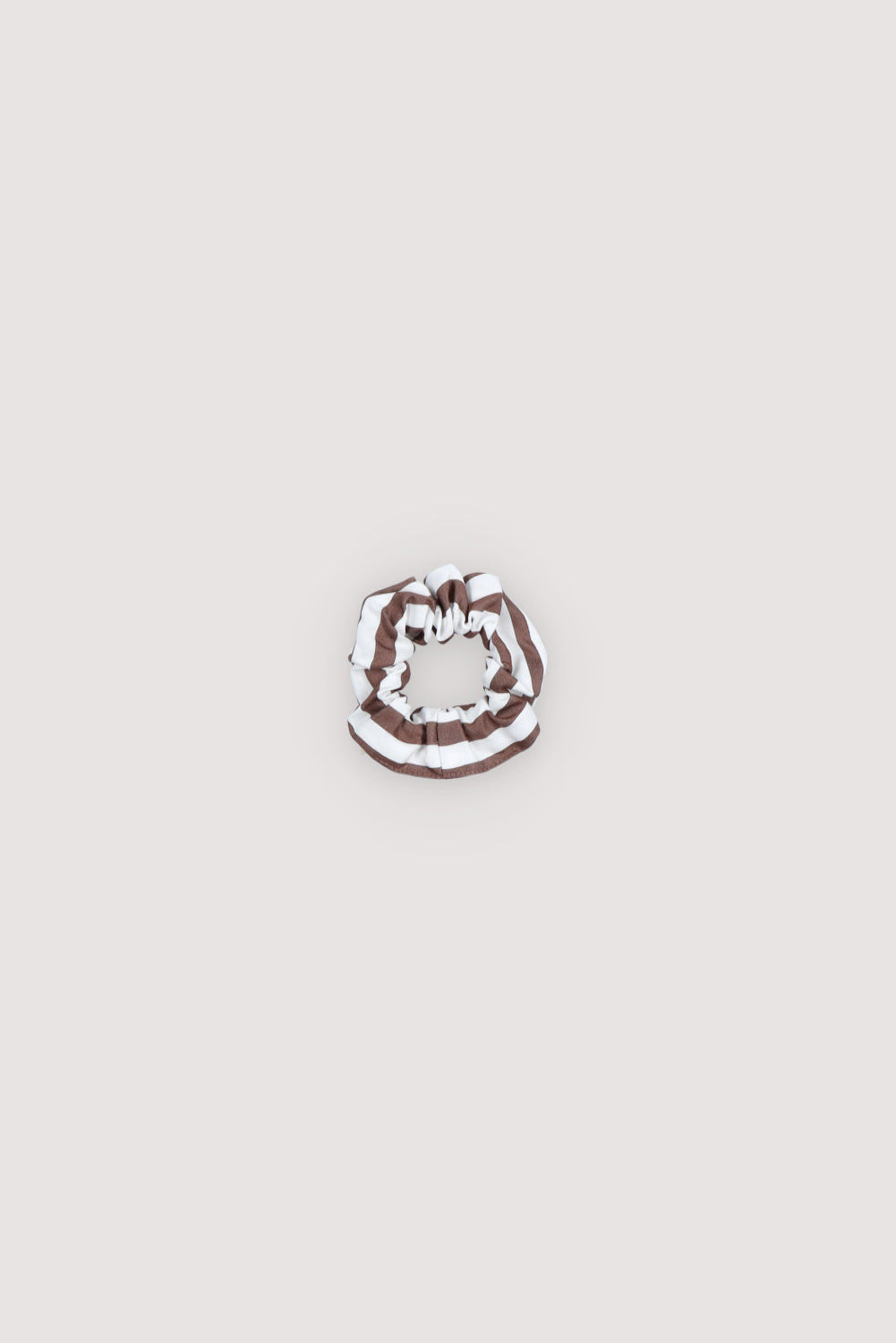 bicolor stripe scrunchie in Roast Stripes is made from Tencel for a gentle hold and smooth finish. Woman Collection the new society