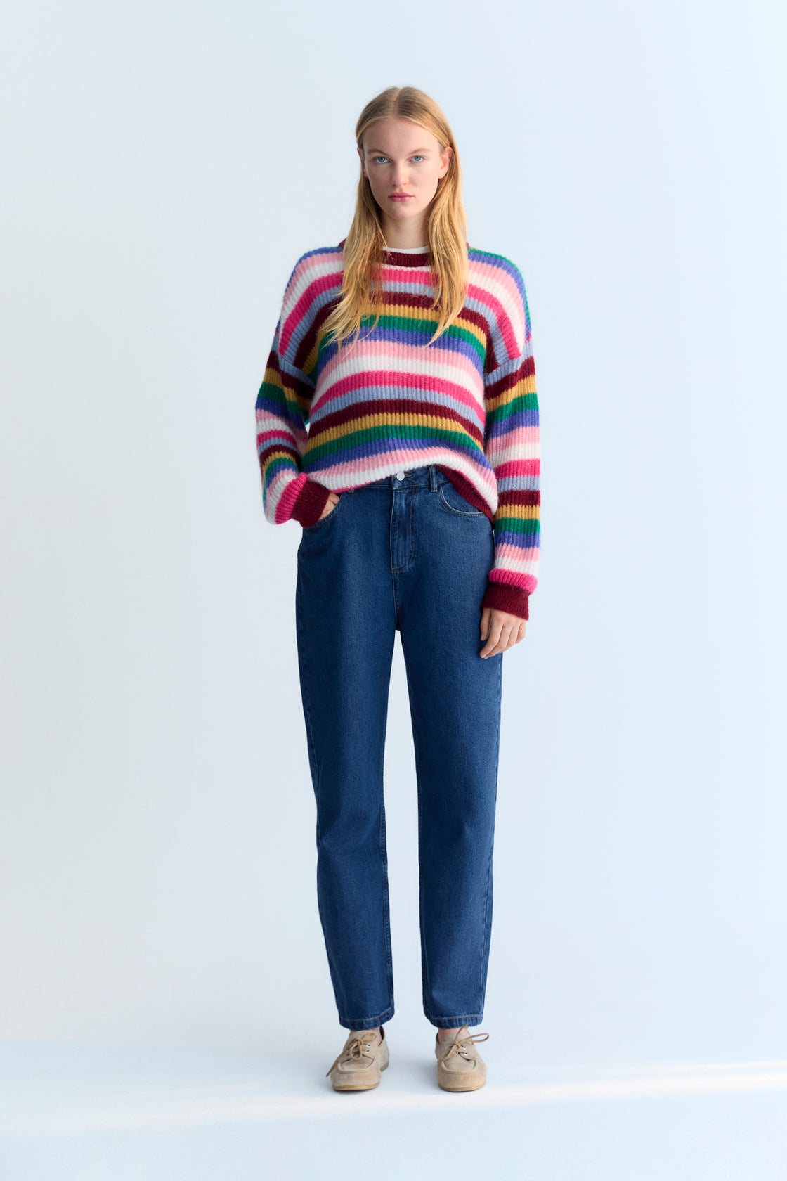 Fine-knit multicolor mohair sweater with a round neckline.