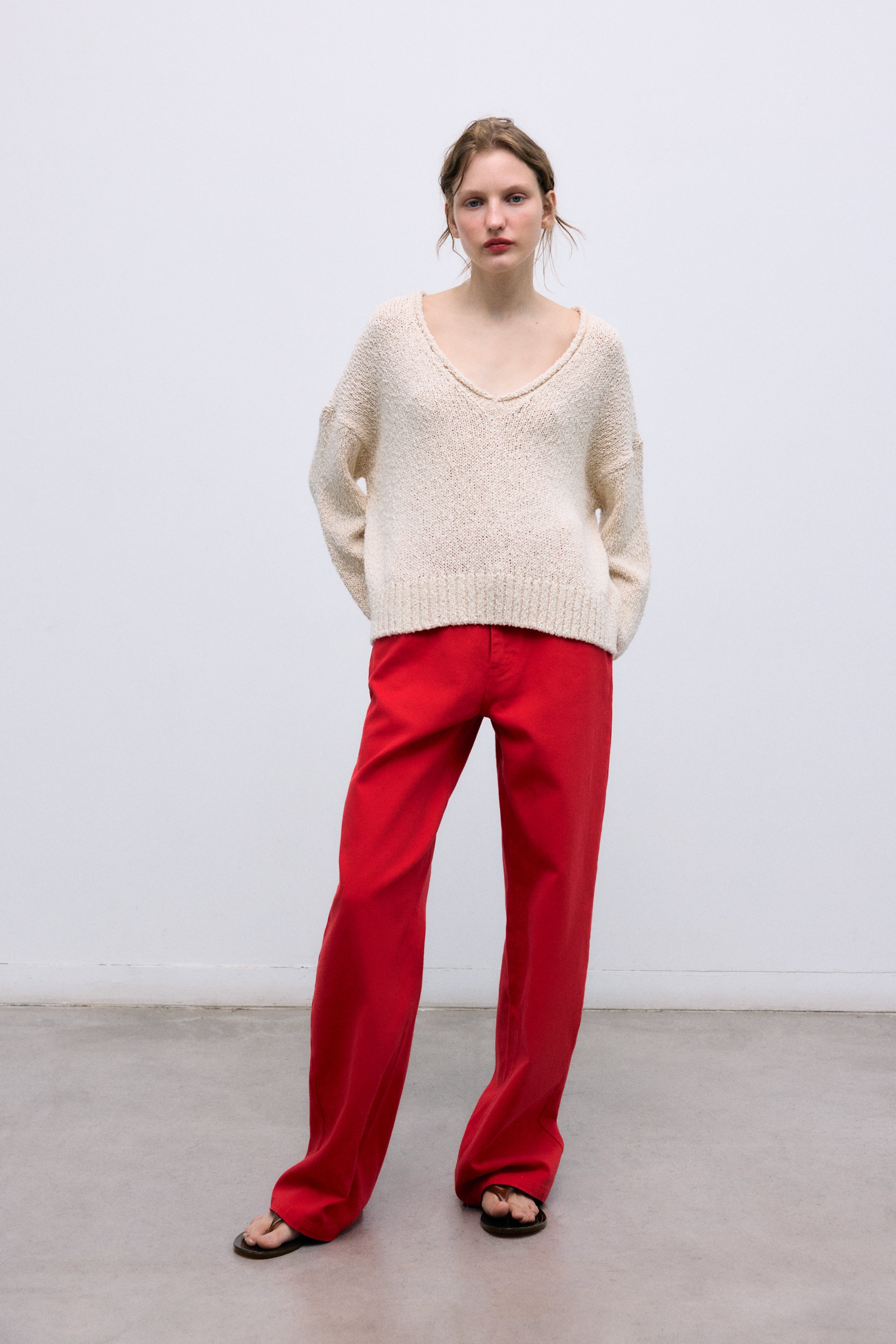 100% cotton sweater crafted with a rustic knit texture for a natural yet modern look.