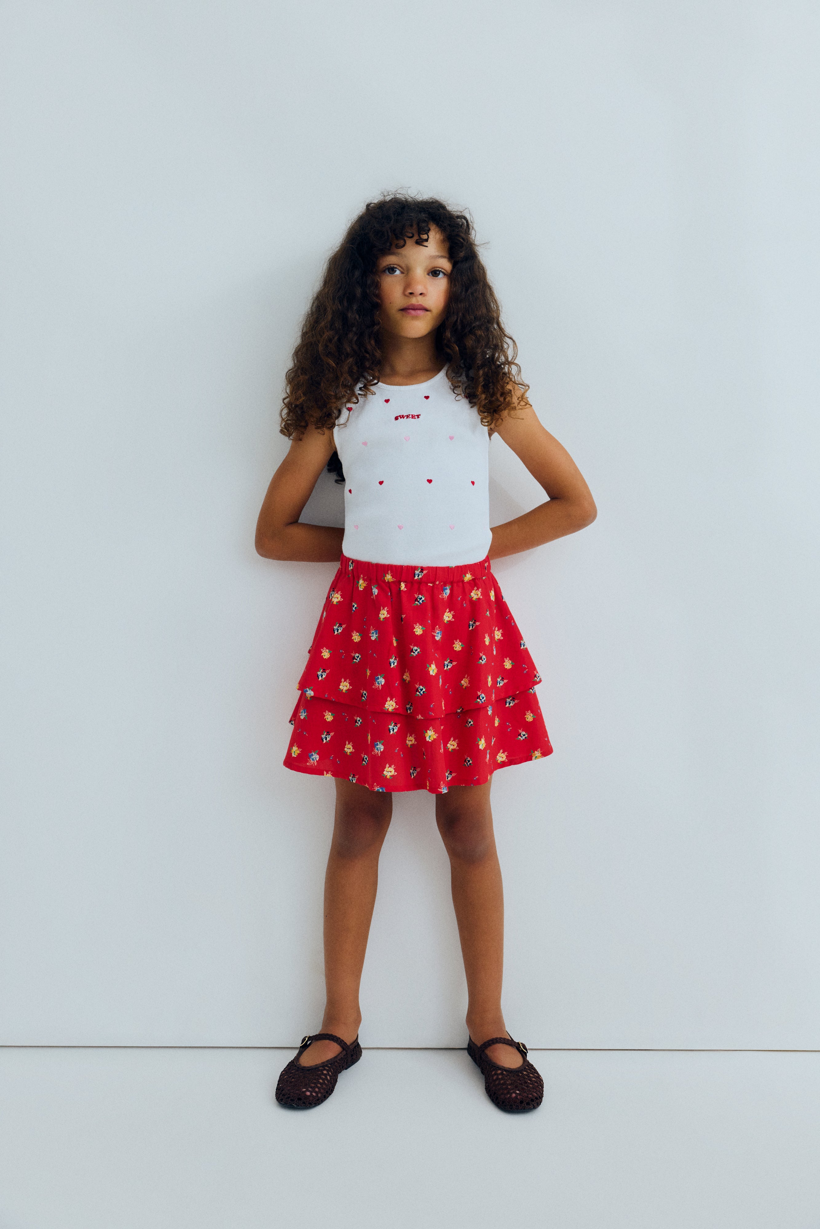 A pretty skirt crafted from 100% organic cotton with a vibrant multicolor floral print.