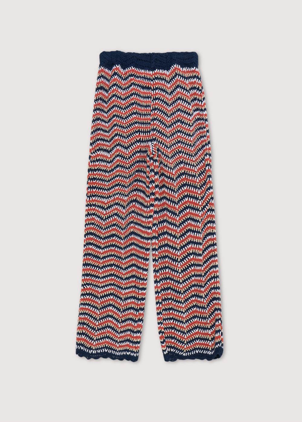 Tricolor crochet pants with curved finishes and elastic waistband. This is a perfect garment to pair with matching cardigan. Spring Summer Collection. The New Society.