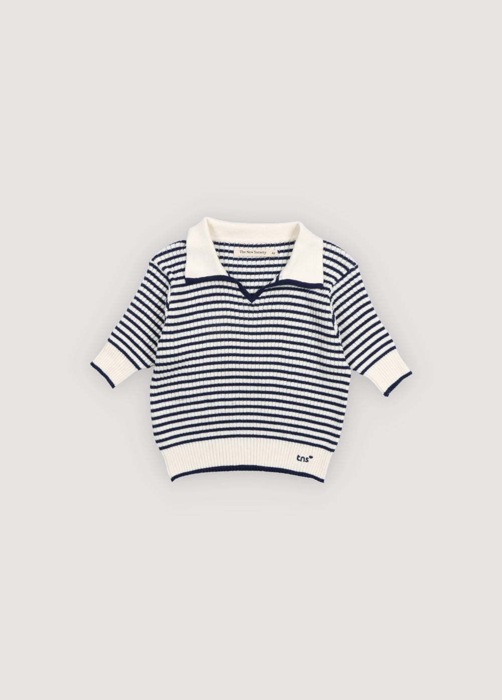 A lightweight knit polo with classic sailor style stripes and a subtle branded embroidery on the rib.