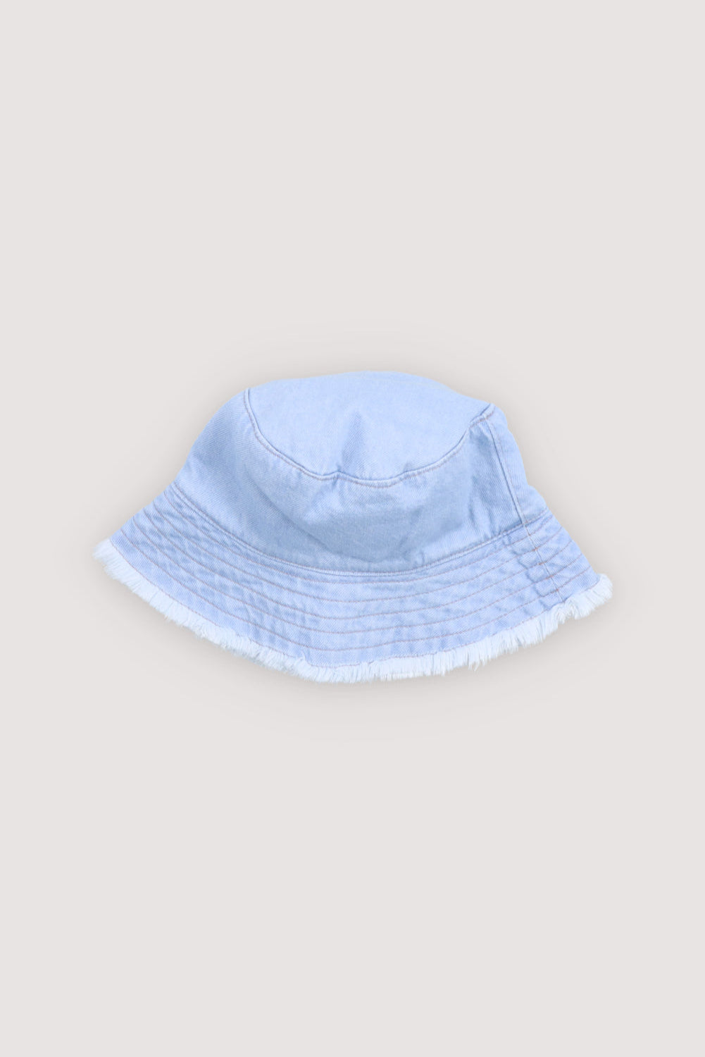 Washed denim bucket hat with a wide brim and adjustable straps for a comfortable fit.
