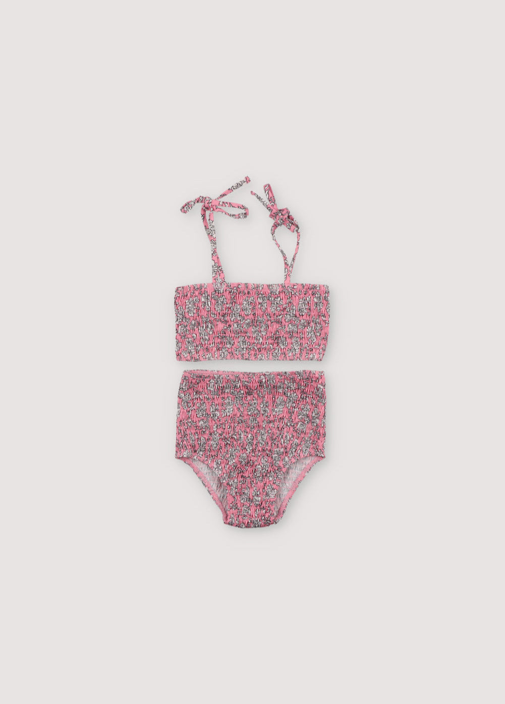Bikini with floral print and smocking on both pieces, featuring straps to tie on the shoulders.