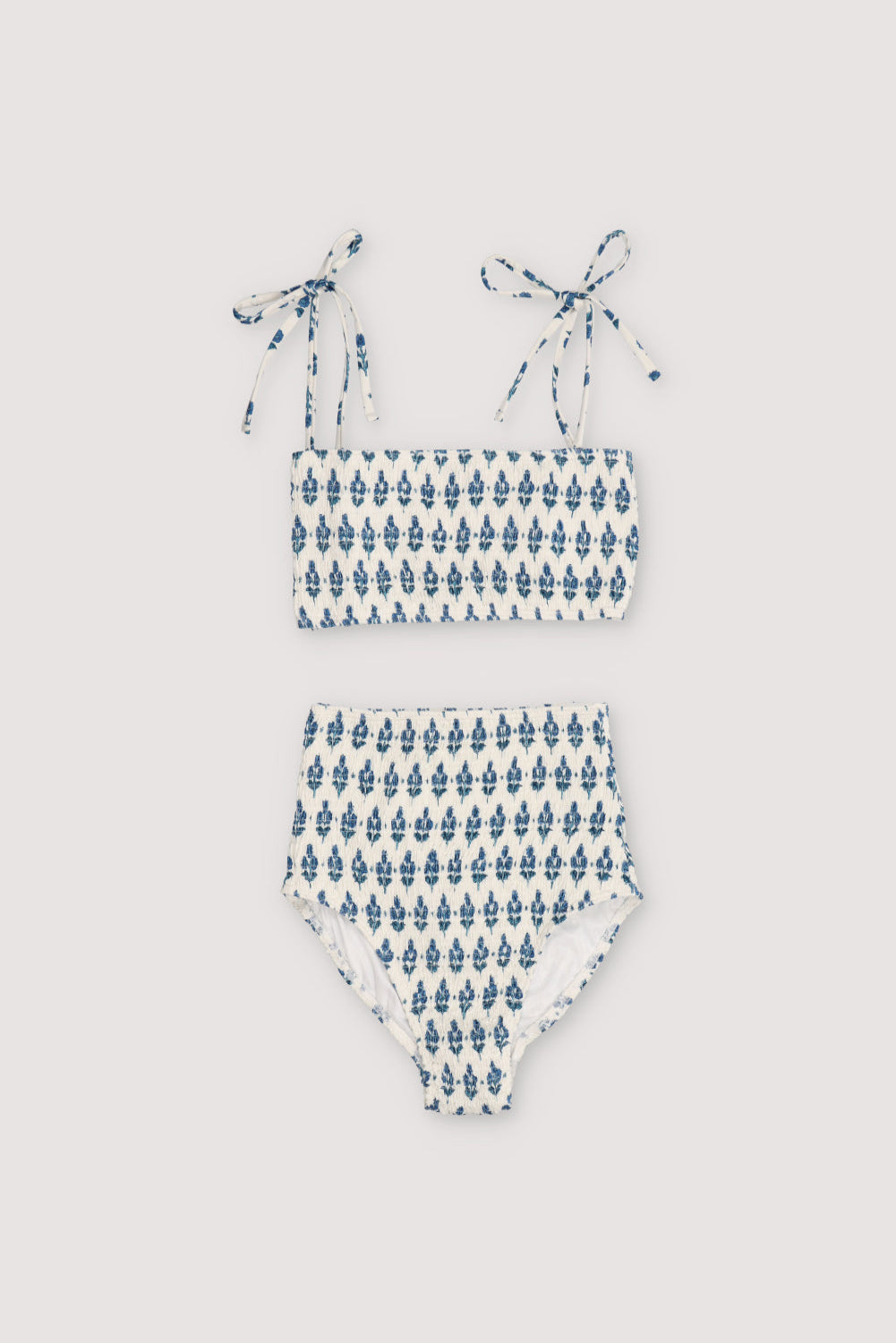 Bikini with stamp print and smocking on both pieces. It has a high-waisted style. Spring Summer Collection. The New Society.