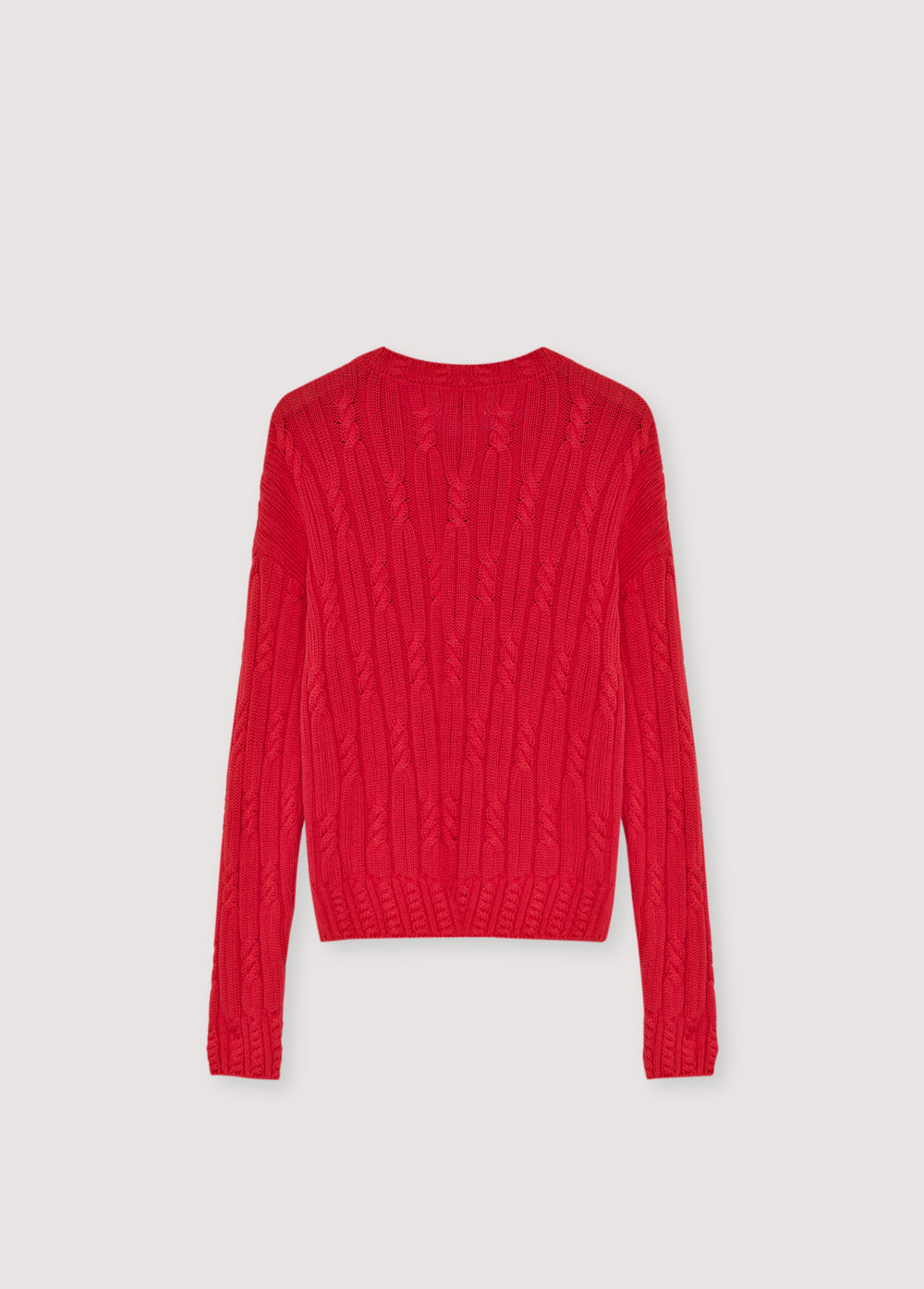 Cable knit sweater in soft cotton, featuring delicate cable details on the collar, cuffs, and hem.
