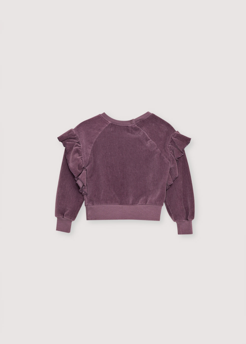 Velvet corduroy jersey sweatshirt with a unique ruffle detail on the shoulders and brand embroidery on the chest. It has an opening at shoulder with snaps. It comes with matching pants to complete the look.
