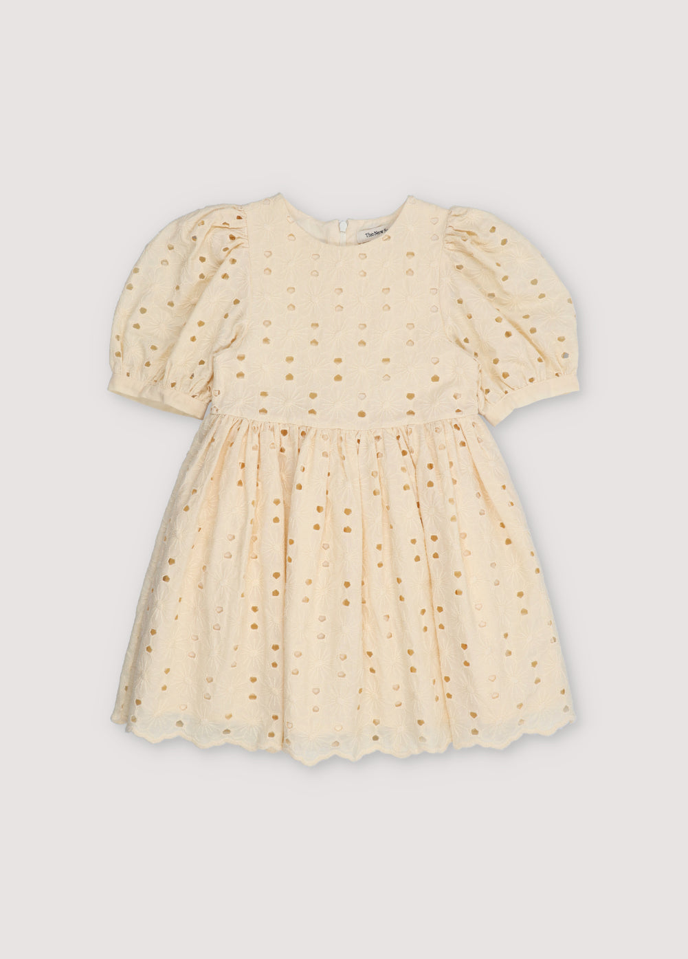 Creta Dress our bestseller now with embroidered blend cotton fabric in macadamia color. Dress with puffed sleeves and a flared skirt. New Collection Kids.