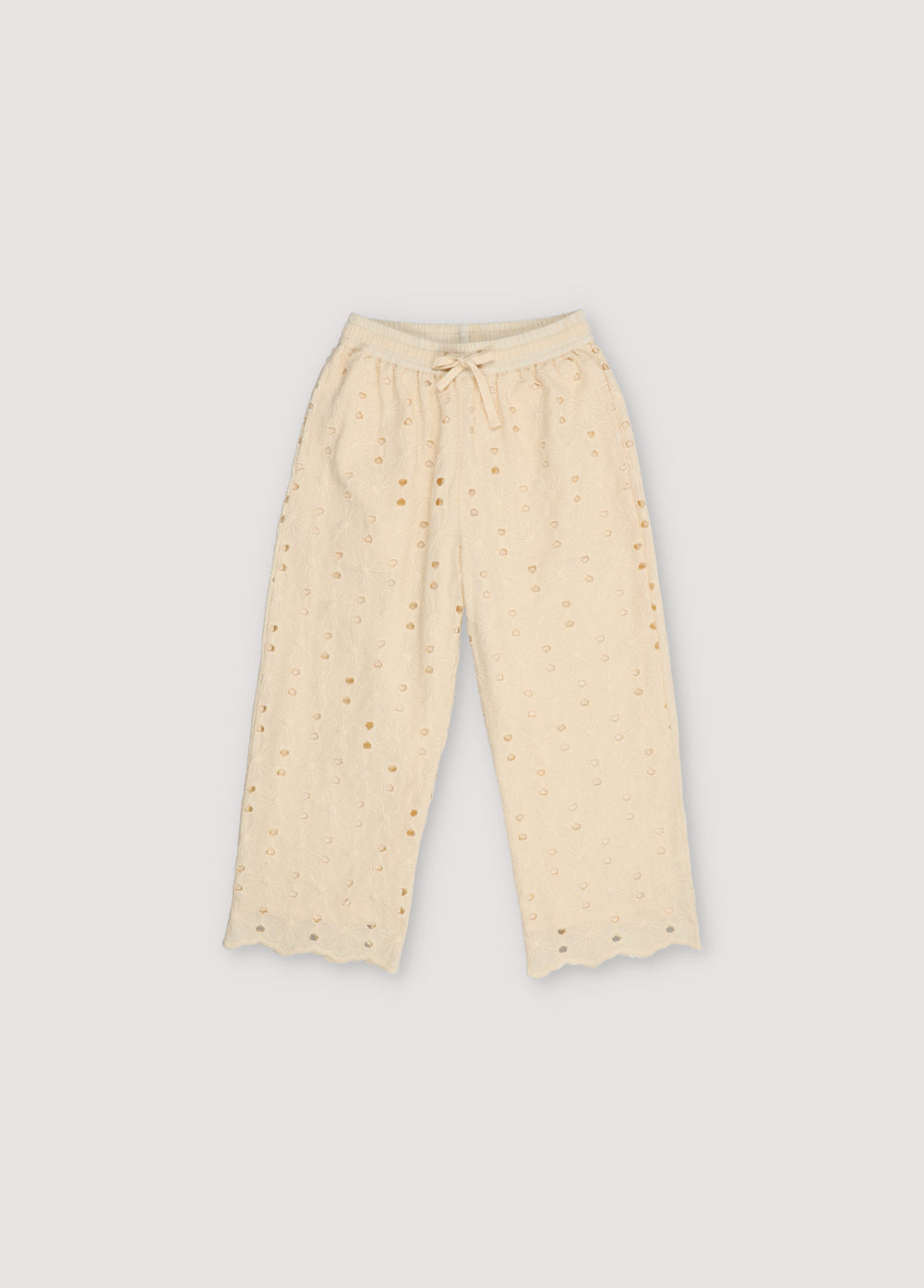 Creta Pant in embroidered blend cotton fabric in macadamia color, with an elastic waistband and a drawstring of the same fabric for adjustment. New Collection. The New Society