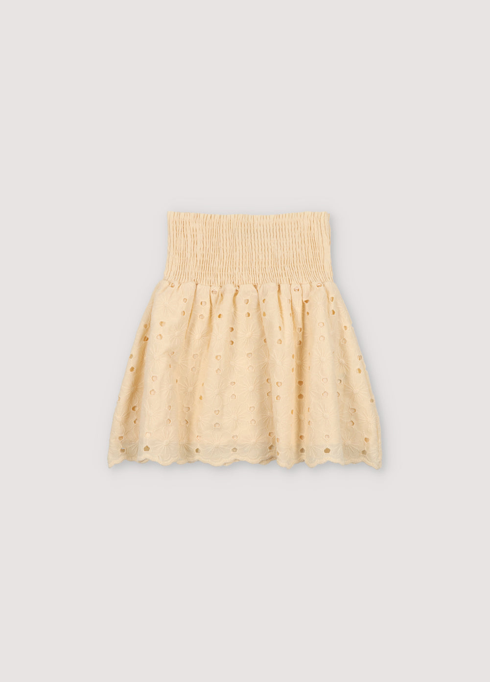 Creta Skirt in embroidered blend cotton fabric in macadamia color, featuring an elastic waistband.