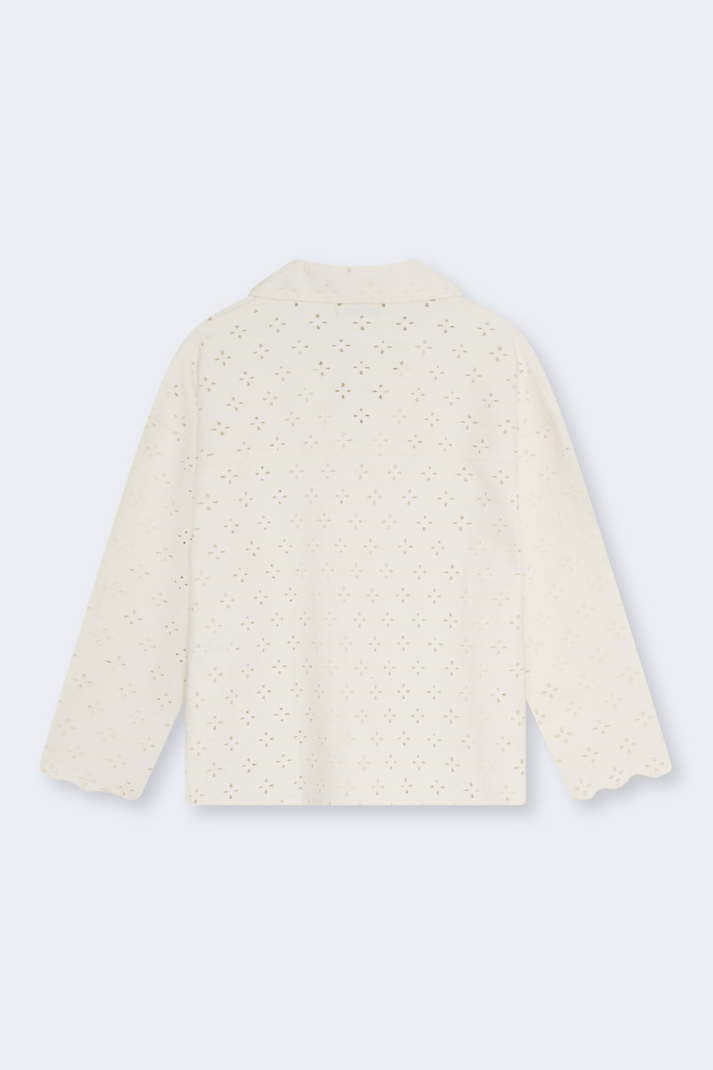 Polo-style blouse with a shirt collar and front opening, crafted from a delicate and special denim fabric featuring all-over embroidery for a unique textured finish.