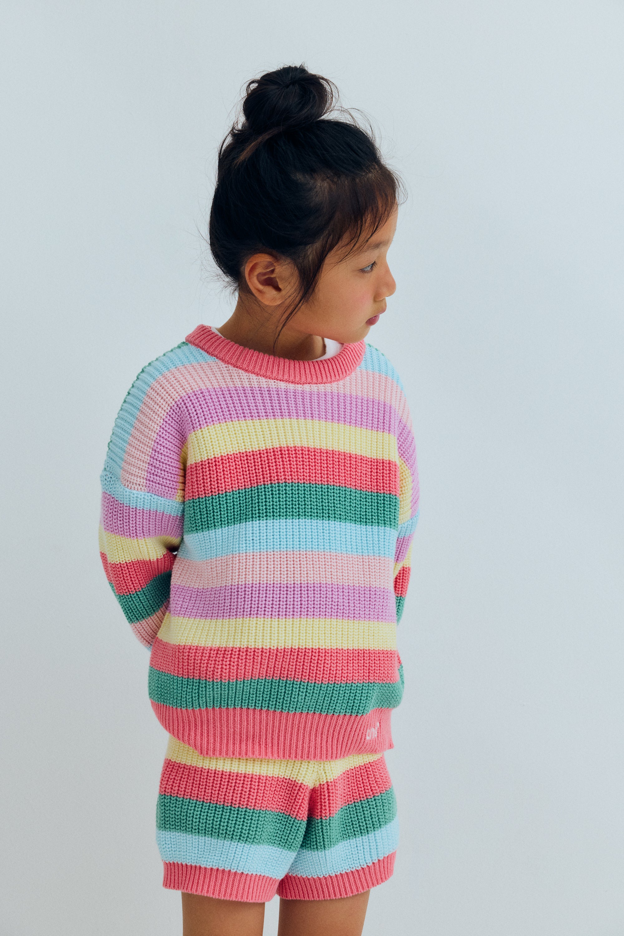 Our classic fine cotton knit for summer, featuring a playful multicolor stripe design and ribbed finishes at the neckline, cuffs, and hem