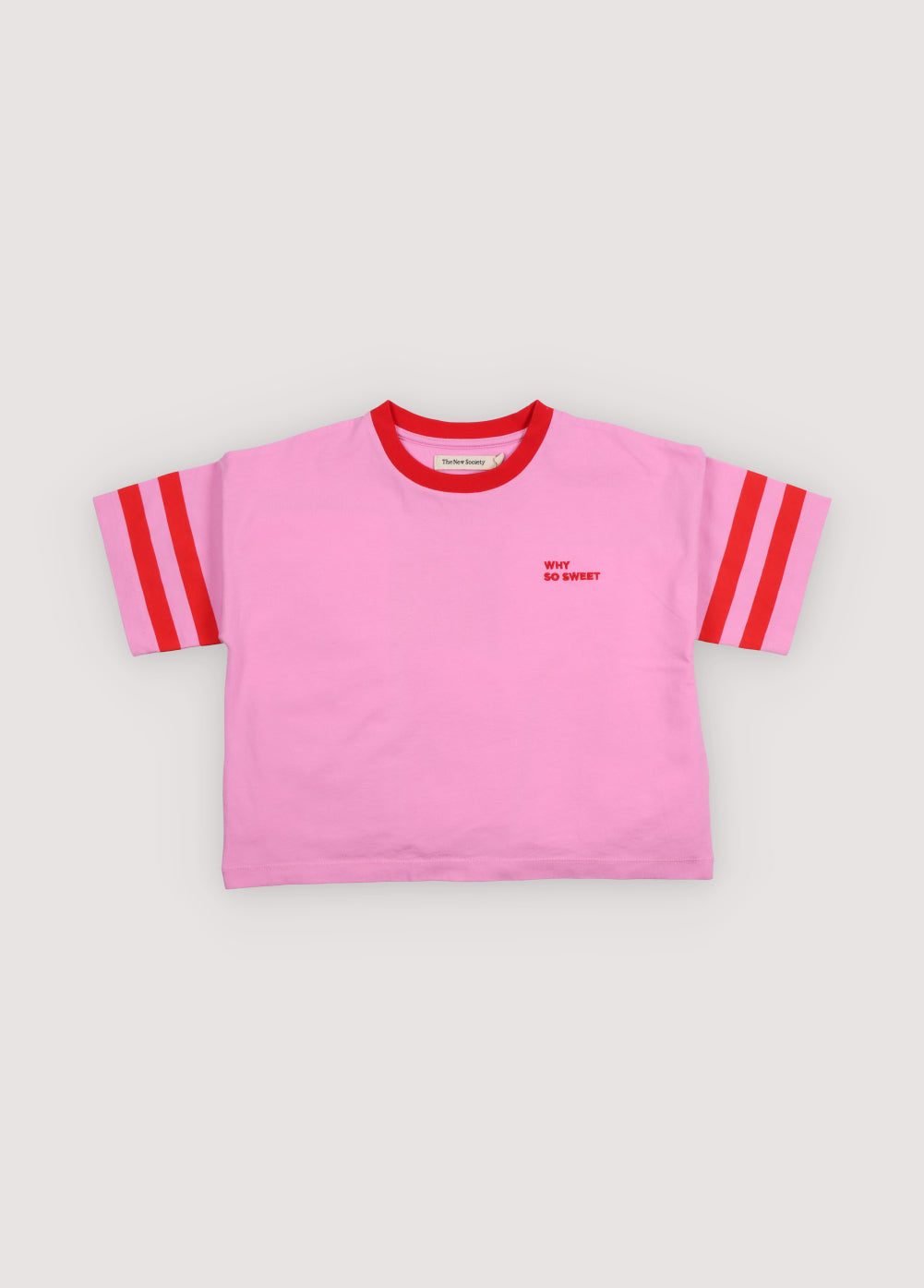 Crop style t-shirt in soft cotton, featuring contrasting branded embroidery, a stripe print on the sleeve, and a collection print on the back for a playful, modern look.