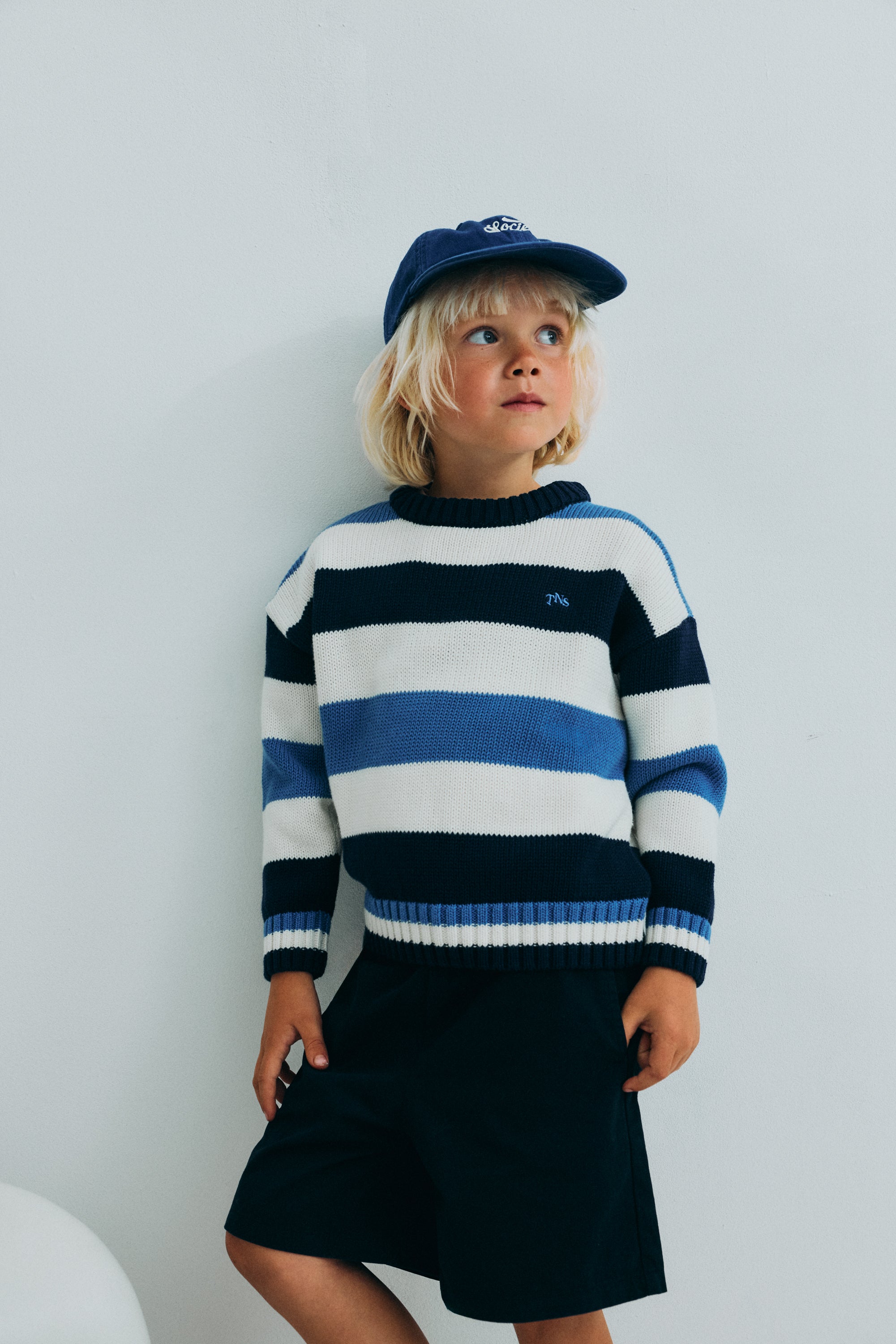 Our classic striped cotton knit featuring ribbed striped details that make this piece special and unique.