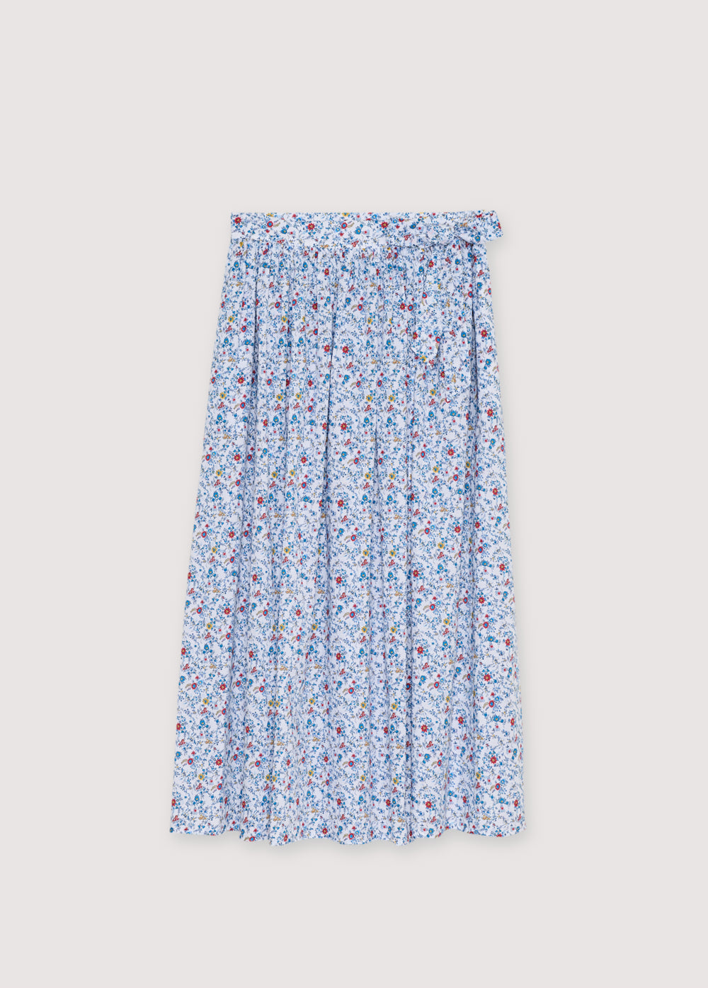 Bring a touch of timeless femininity to your wardrobe with this blue floral skirt, perfect for elevating both casual and polished looks