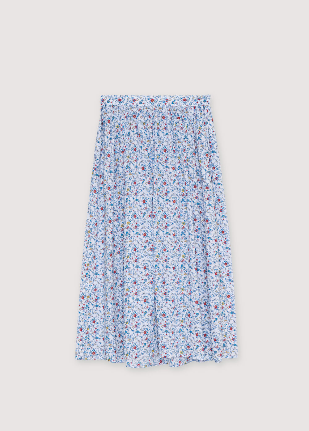 Bring a touch of timeless femininity to your wardrobe with this blue floral skirt, perfect for elevating both casual and polished looks