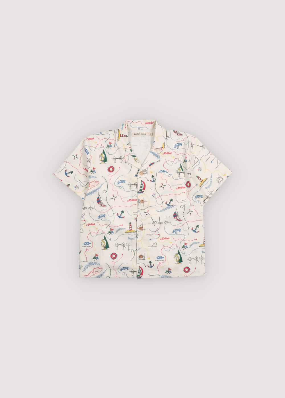 Short sleeve shirt in soft cotton featuring a unique multicolor map print and a front button closure with wooden buttons.