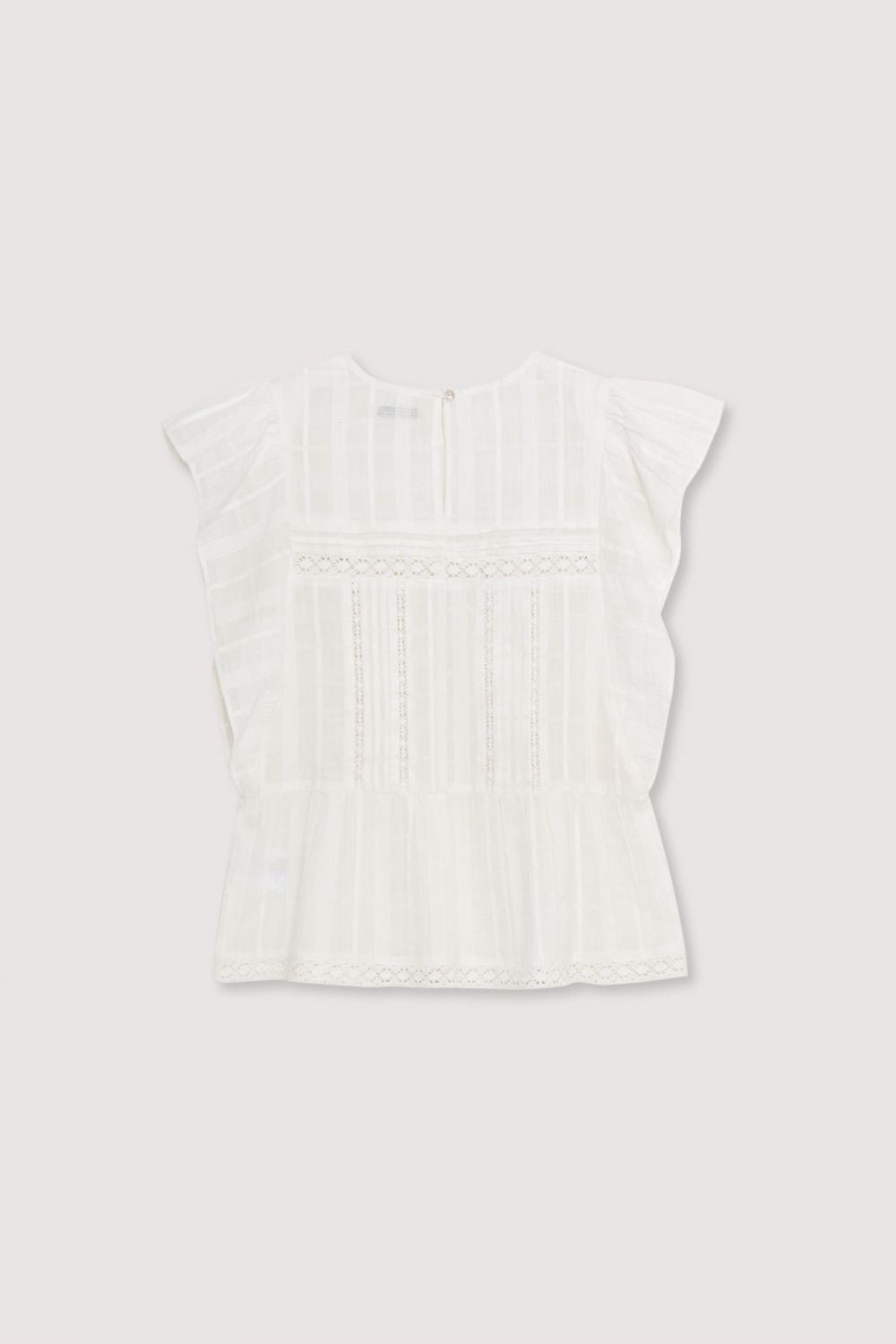 Blouse with jacquard fabric and lace details. It features ruffles on the sleeves and an opening at the back with mother-of-pearl button. Spring Summer Collection. The New Society.