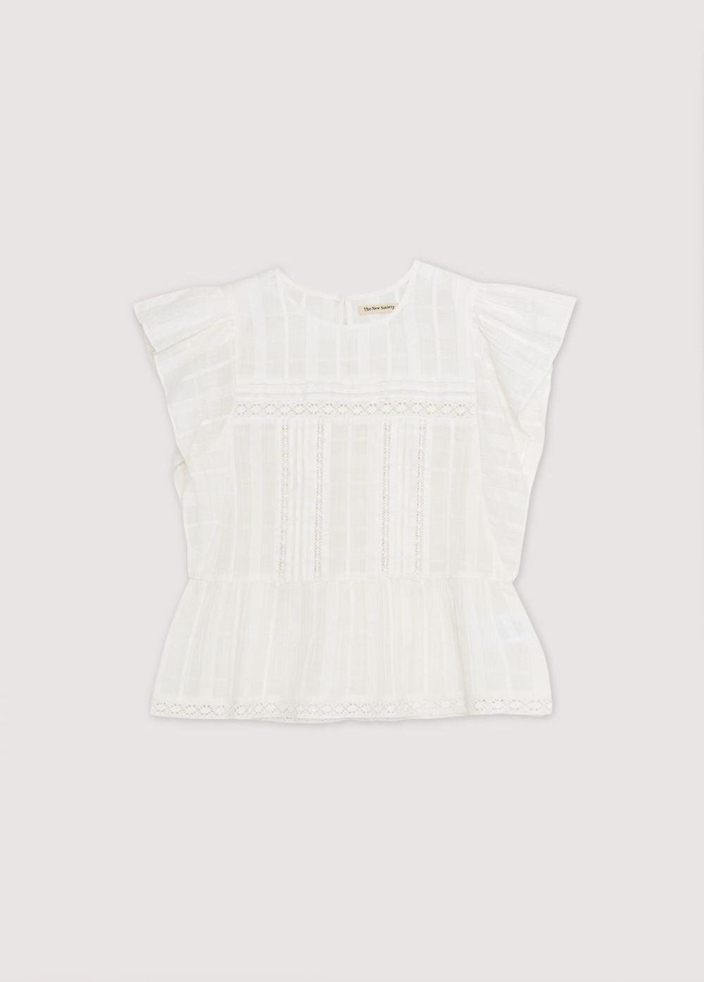 Blouse with jacquard fabric and lace details. It features ruffles on the sleeves and an opening at the back with mother-of-pearl button. Spring Summer Collection. The New Society.