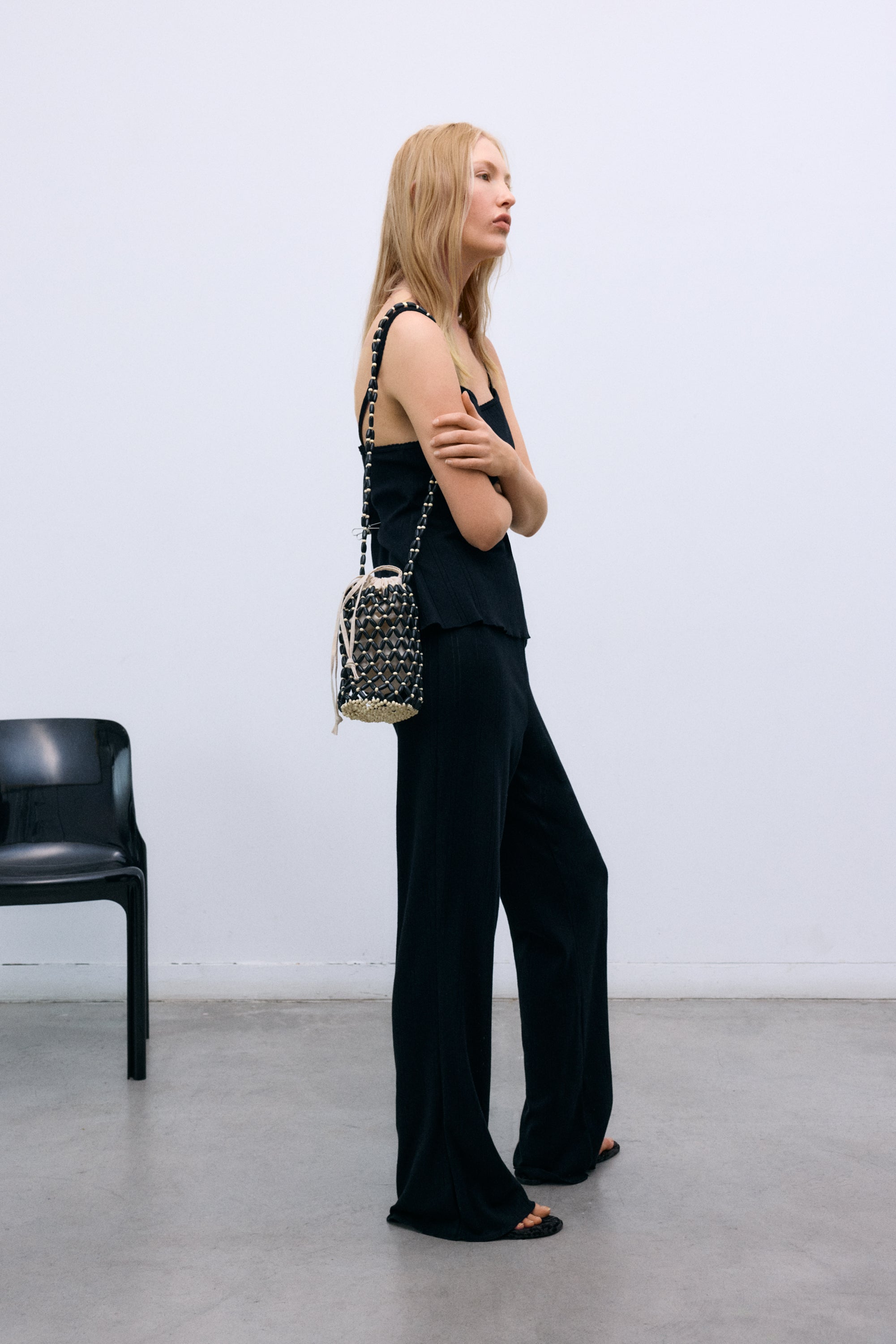 Handcrafted bag designed with contrasting two-tone panels for a modern, artisanal look. Features an inner cotton pouch with a drawstring closure, combining practicality with style