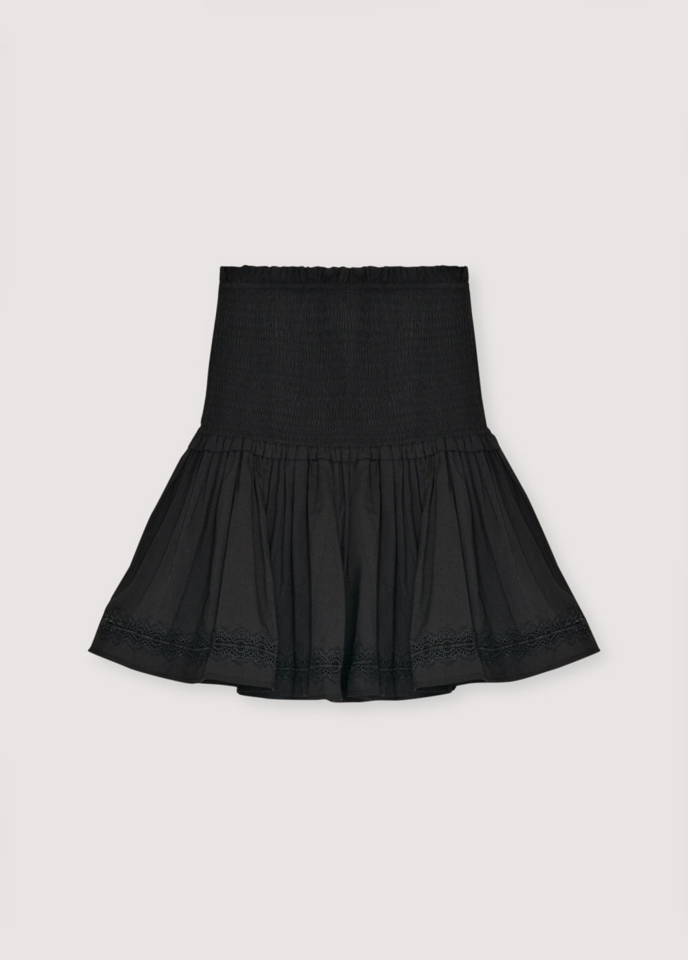 Cambric skirt with smocking detail at the top and a ruffled hem with lace trim. Perfect for pairing with the matching blouse.