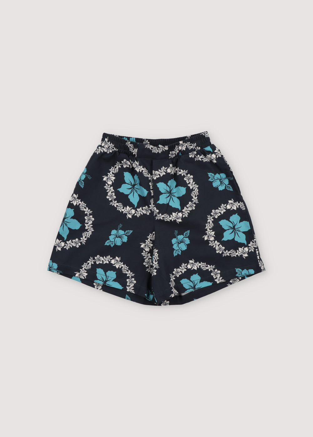 Dionisio Bermuda in 100% cotton fabric with our Kulkos Navy print, featuring an elastic waistband, zipper, and side pockets.