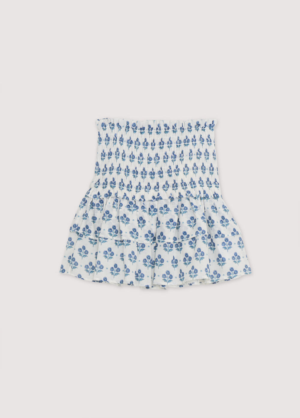 Eleni Teen Skirt in 100% cotton muslin fabric with our hyacinth print. The skirt has a smocked waistband and two flared ruffles.