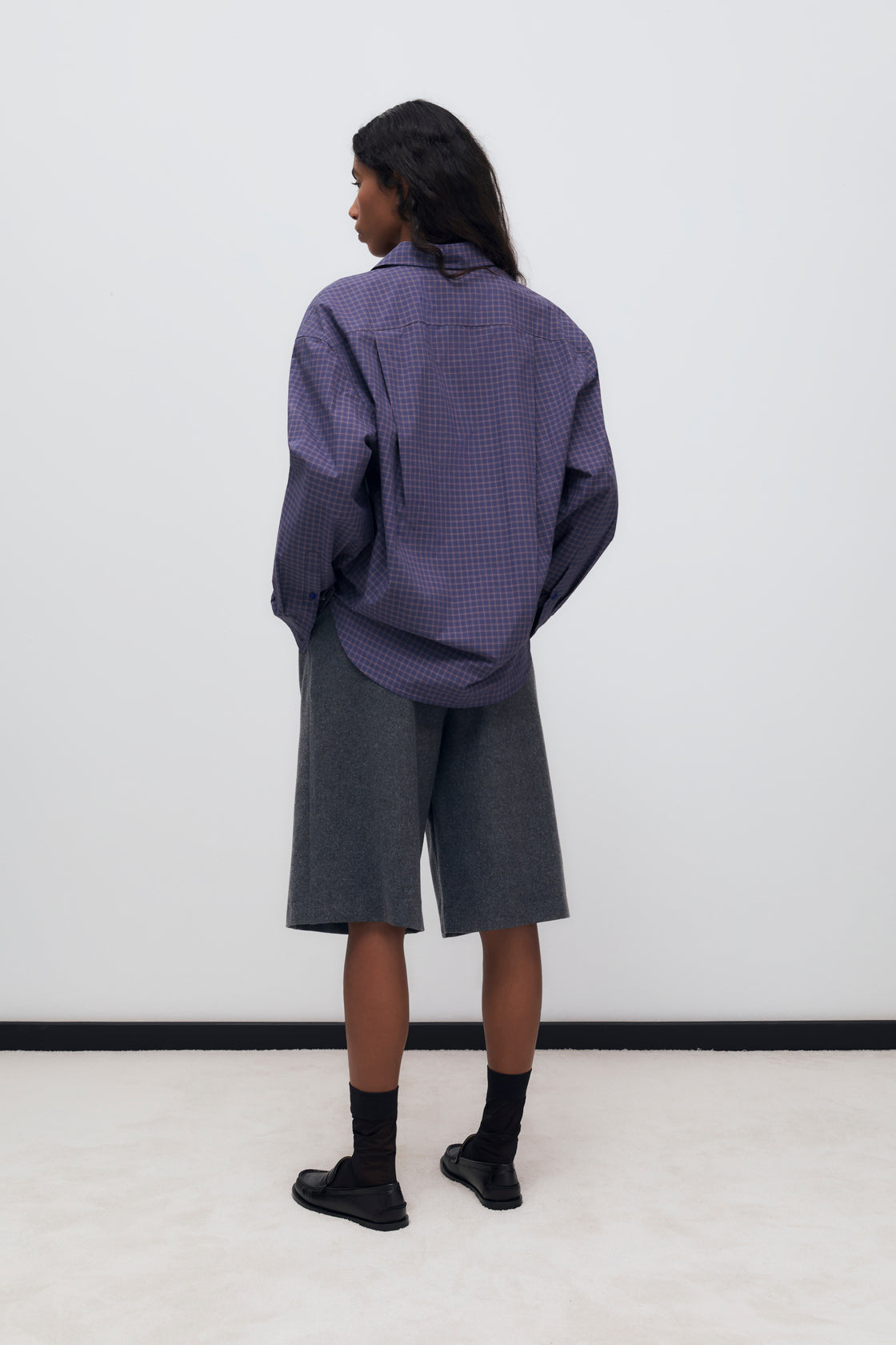 Cotton checkered shirt with tone-on-tone buttons and a patch pocket on the front with brand embroidery. It has a matching scarf available to complete the look.