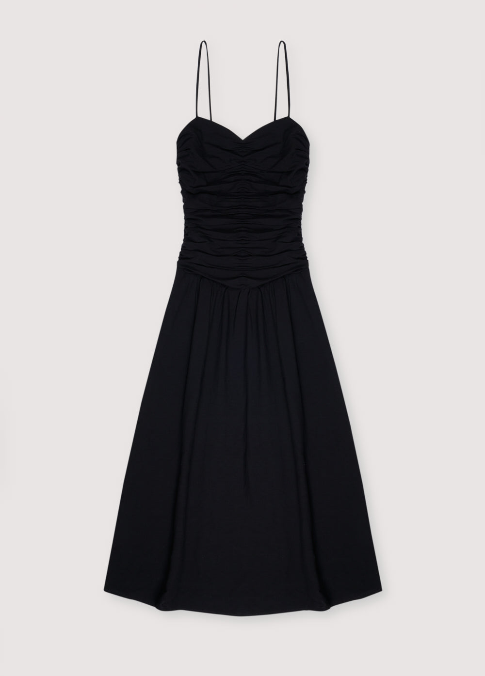 Long dress with gathering on the front and back bodice. It has thin straps with adjusters and an invisible zipper on the side. Woman Collection. The New Society