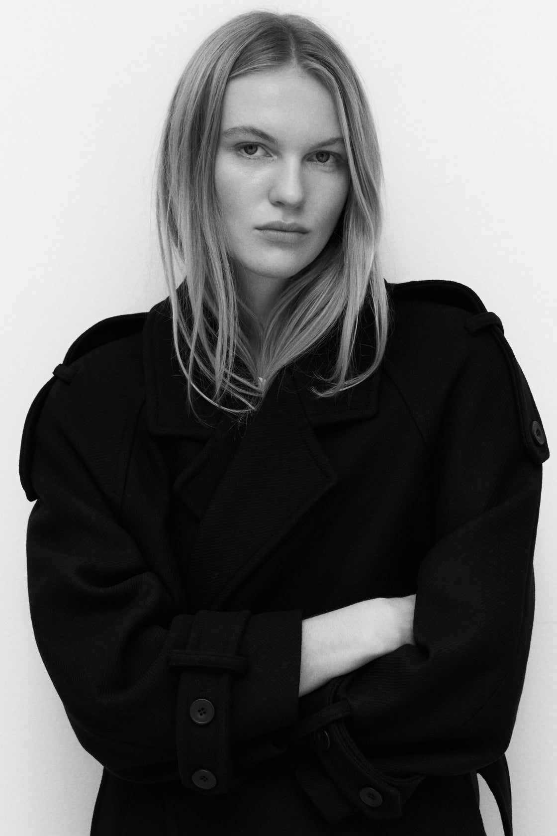 One of our best-selling coats, now in a new version made from high-quality wool. It's a long, double-breasted coat with a matching fabric belt.