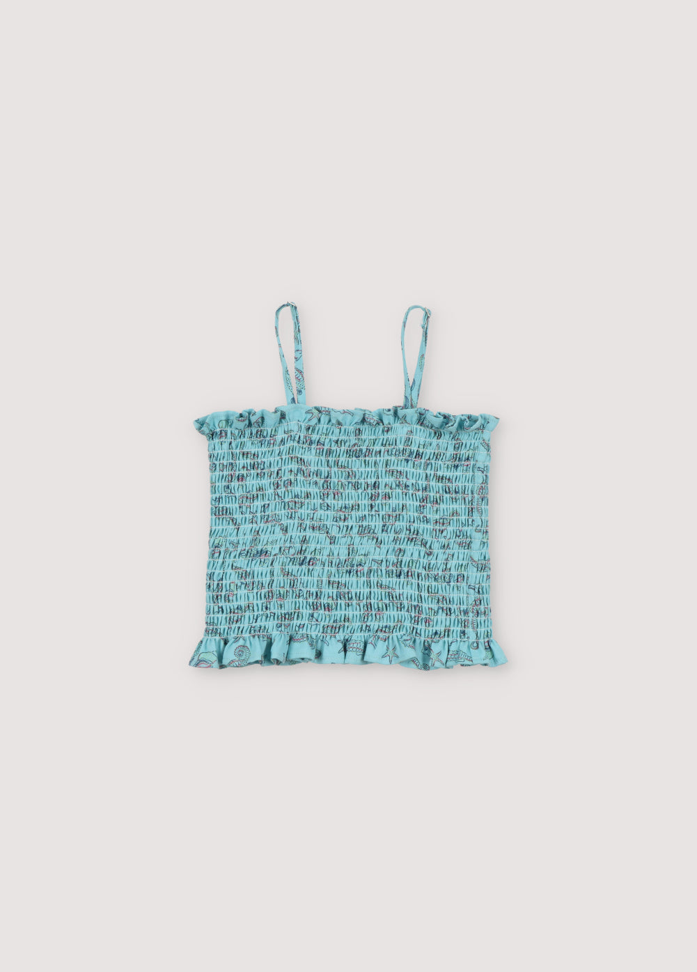 Io our iconic top in 100% cotton with our seahorses print, featuring straps and smocking.