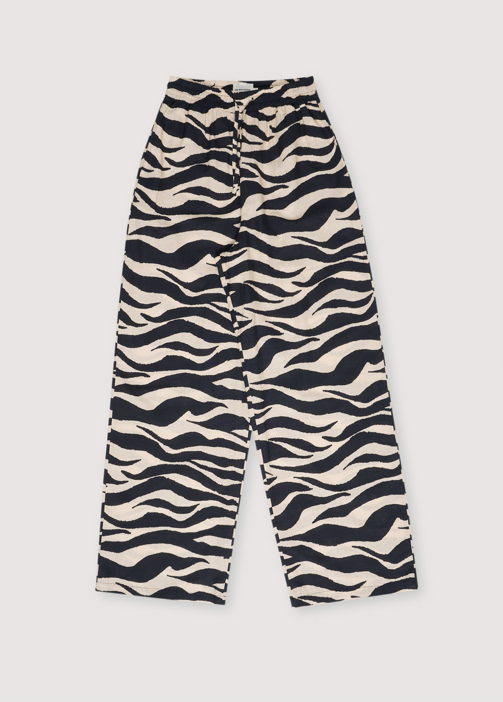 Kavala Woman Pant in 100% cotton with our zebra print. Wide and straight pants with elastic waistband and adjustable drawstring. Spring Summer Collection.