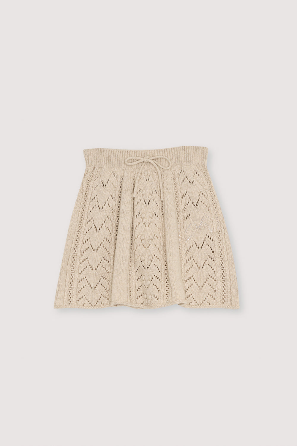 This Moonlight White skirt is crafted from a luxurious blend of recycled cashmere and wool, offering a soft, elevated feel.