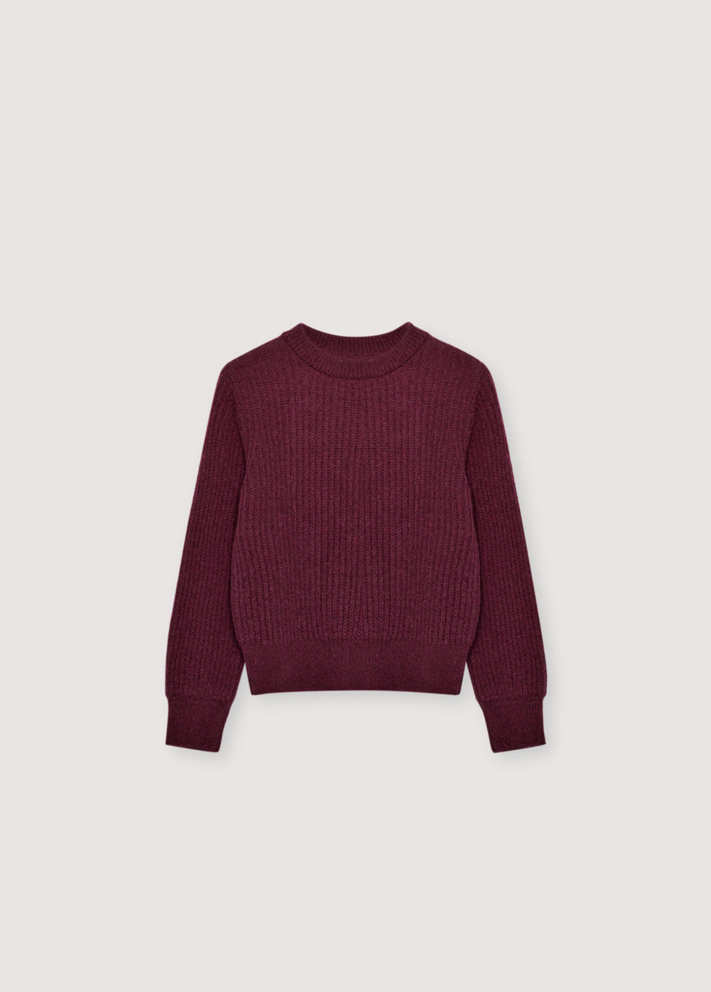 Fine rib knit mohair sweater with a round neckline and ribbing at the neck, cuffs, and hem. It feautures a TNS embroidery on tone on hem rib.