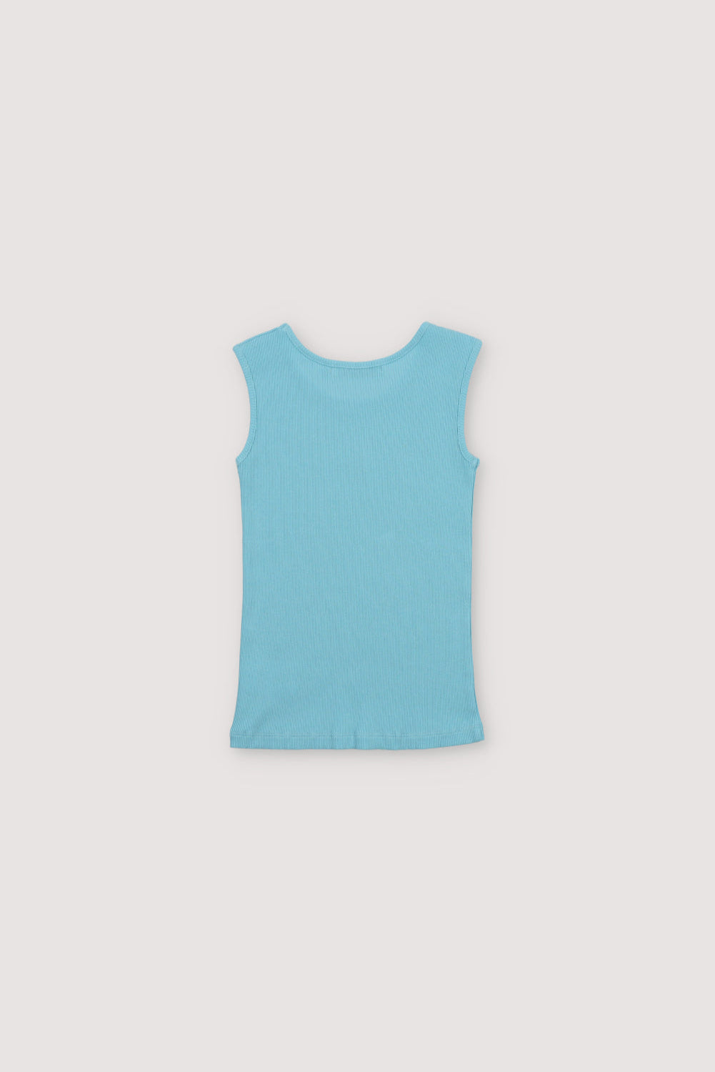 Ribbed top with overlock finish at the hem and a playful contrast embroidery of a seahorse on the chest.