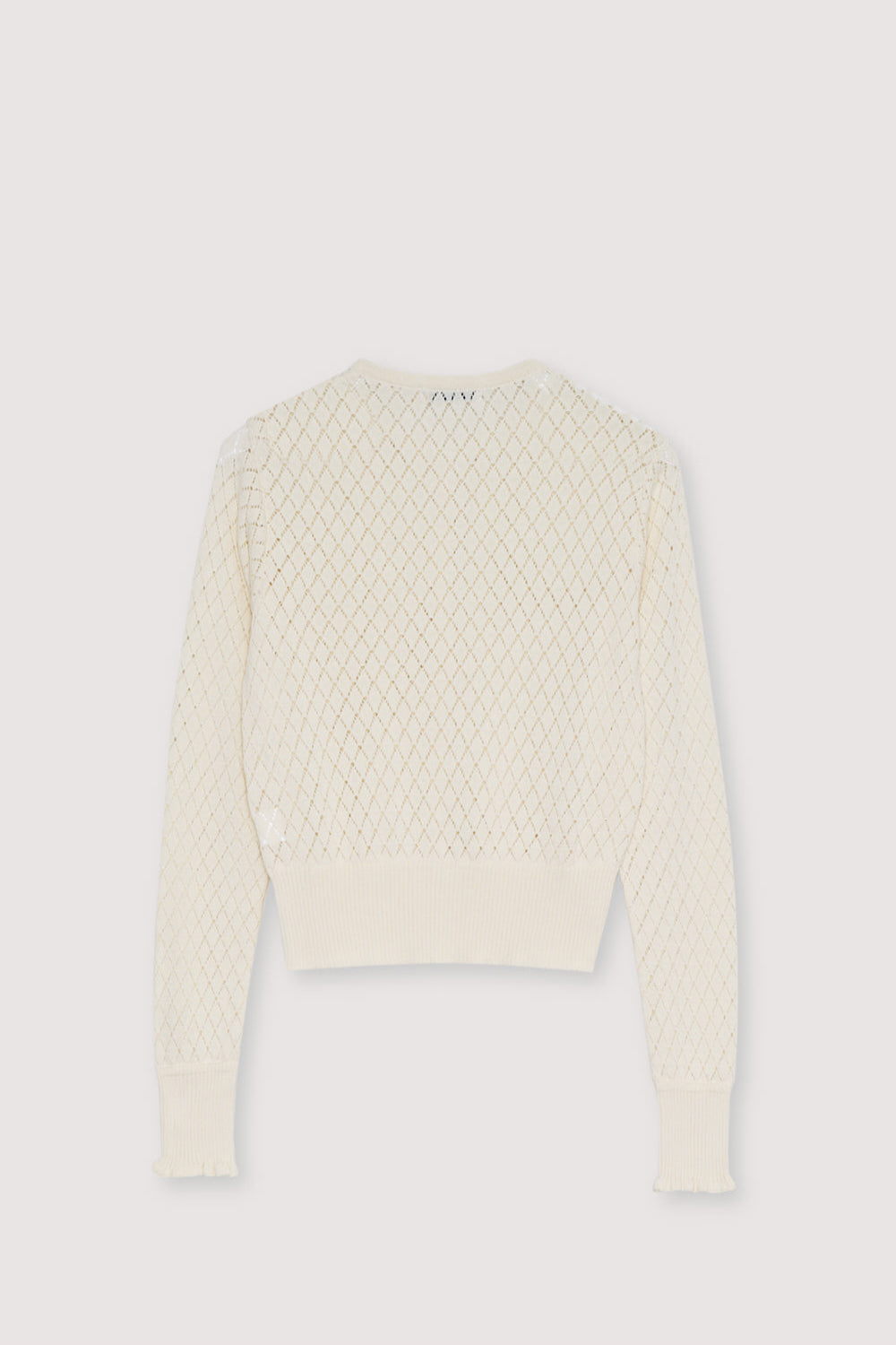 Cardigan tricoté 100 % coton avec un motif de point délicat et magnifique.