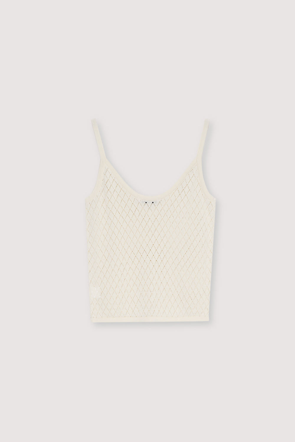 Confectionné en 100 % coton, ce haut en maille fine présente un motif de point délicat et détaillé avec de fines bretelles côtelées.