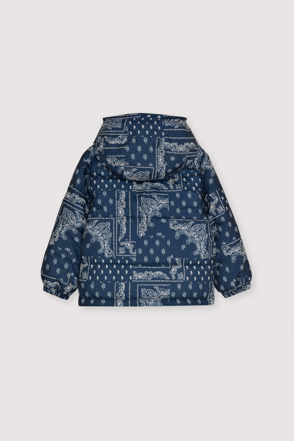 Jacket in outerwear quality with a beautiful bandana print. It features a hood and a patch pocket in the front with a Velcro closure, and a front opening with tone-on-tone snaps and a zipper.