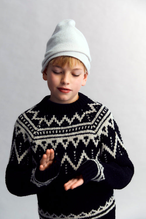 Wool sweater with a beautiful jacquard contrast detail on the front, back, and sleeves.