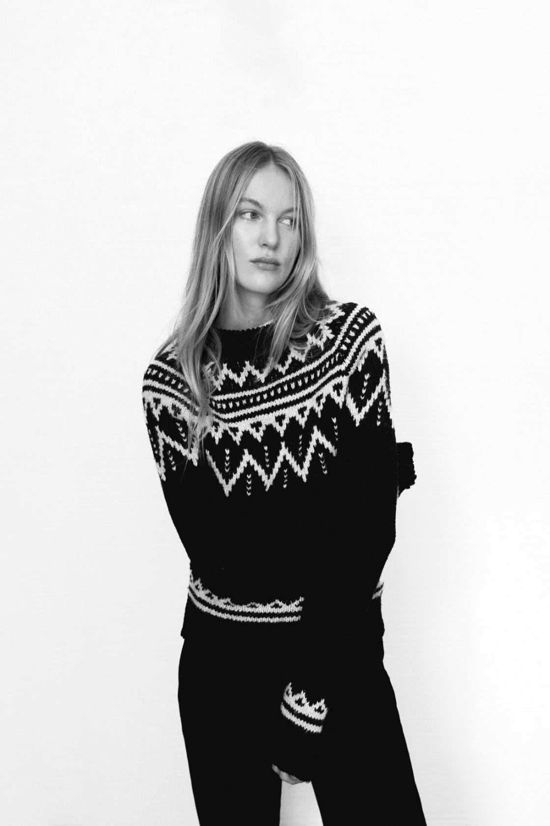 Wool sweater with a beautiful jacquard contrast detail on the front, back, and sleeves.