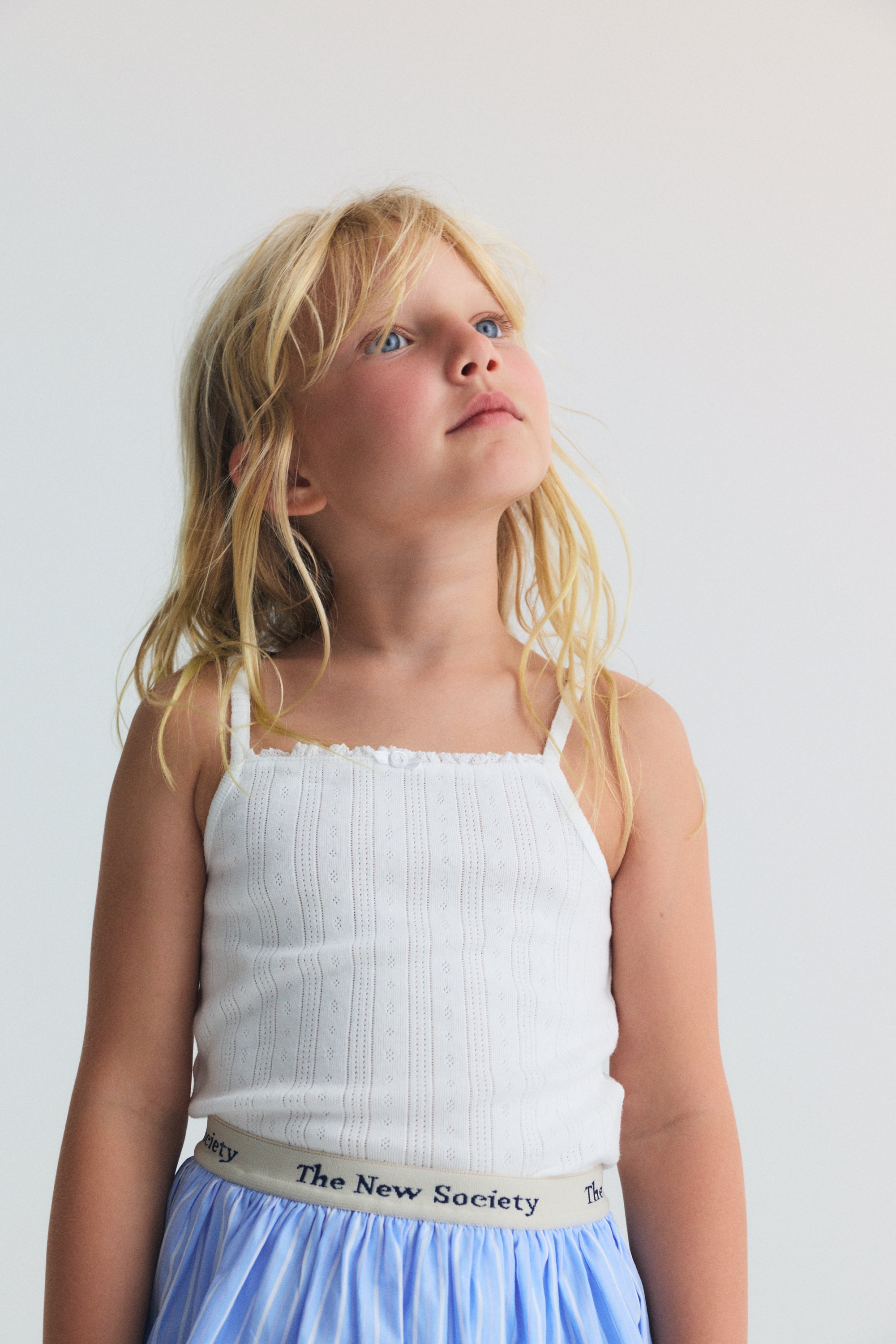 Strappy tee in soft cotton jersey with a lovely openwork knit, offering a light and breathable feel.