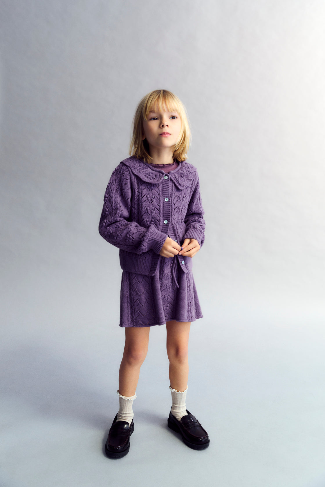 This knit skirt in Grape Bliss combines recycled cashmere and wool for a soft, sustainable fabric blend.