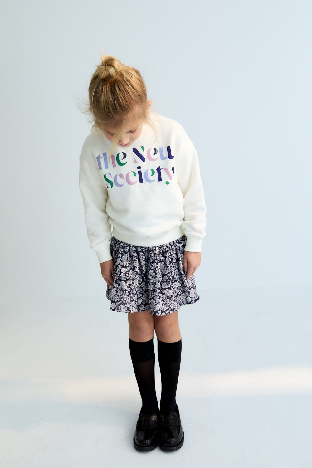 Our timeless classic skirt features smocking at the waist and delicate double ruffles, crafted from soft floral-printed double gauze fabric