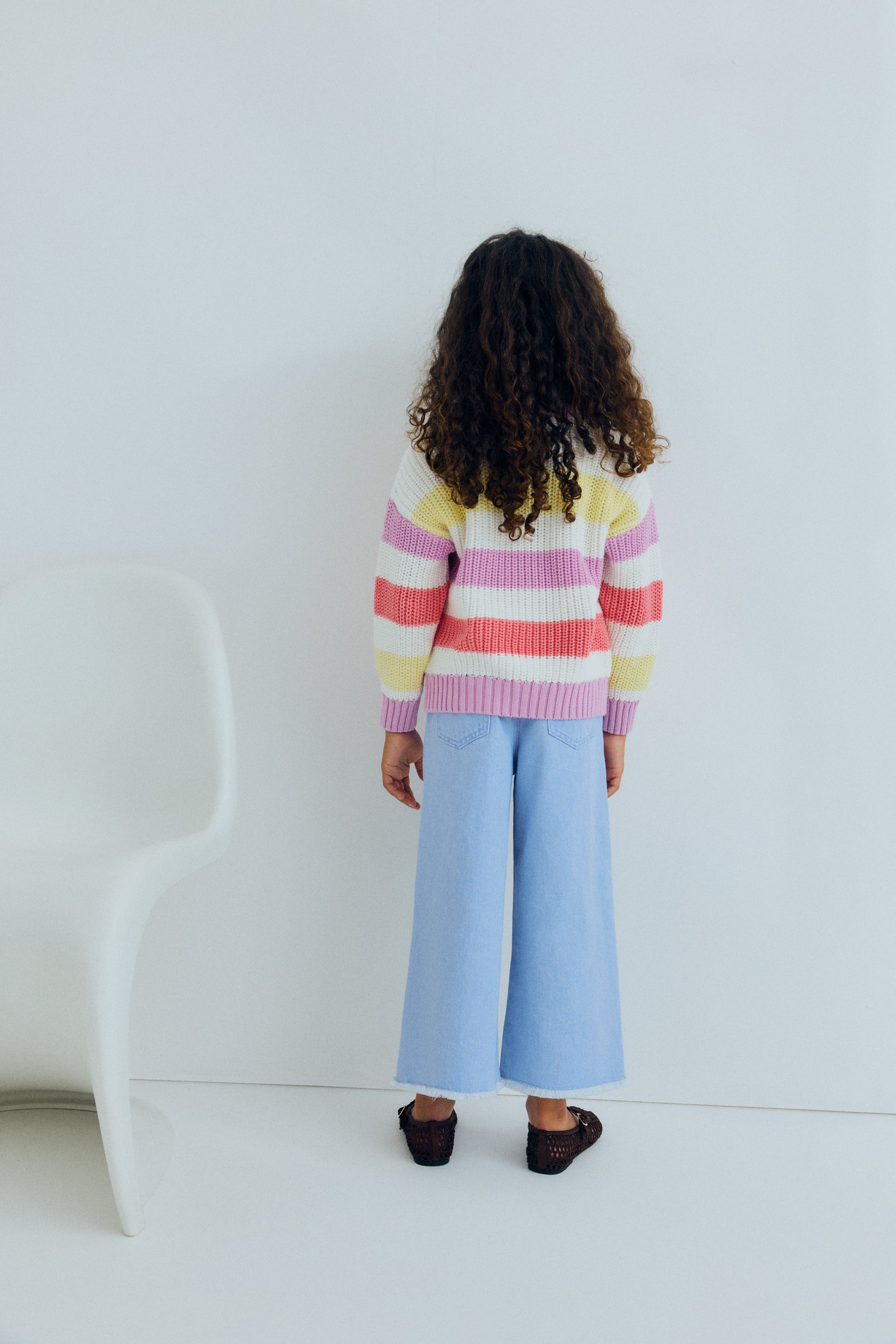 Wide leg denim pants in a soft washed finish, featuring straight legs and an adjustable waistband with interior elastic