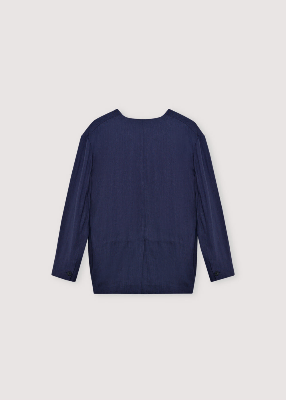 Linen and viscose blazer made in our workshops in Spain. Features a front opening with a notched collar, tone - on-tone button closure, and two front pockets.