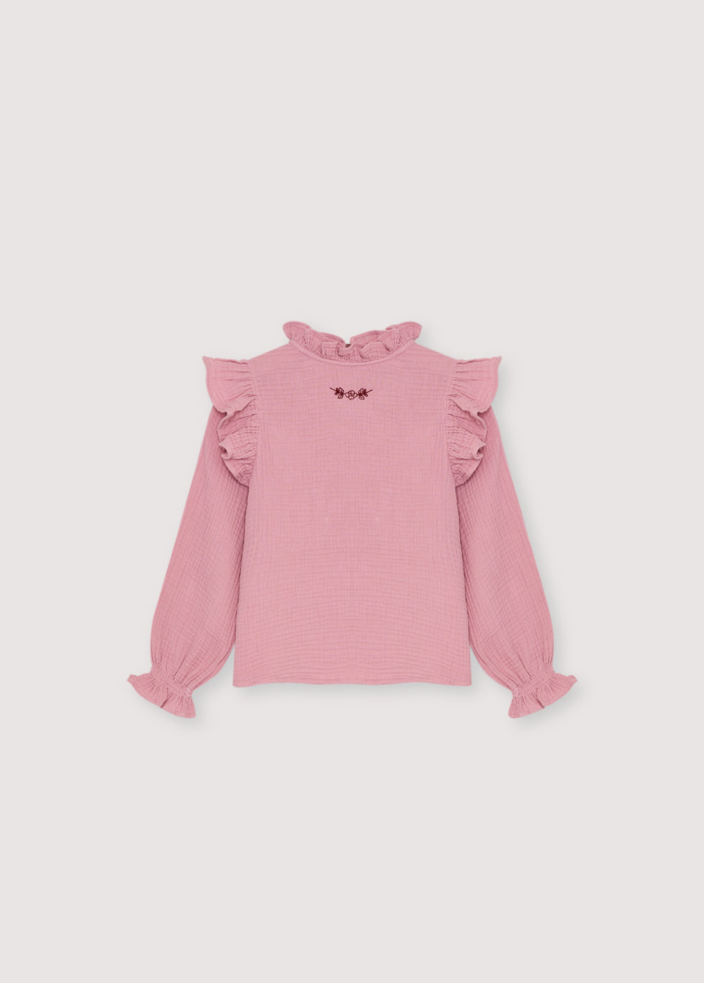 Uno de nuestros patrones clásicos de blusa de gasa doble, con detalle de bordado en contraste en la parte delantera.